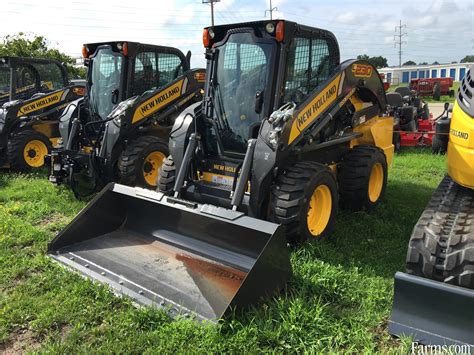 blue and green skid steer loaders|new holland steer loaders.